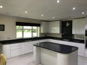 Blue Pearl Granite Kitchen with white cabinets